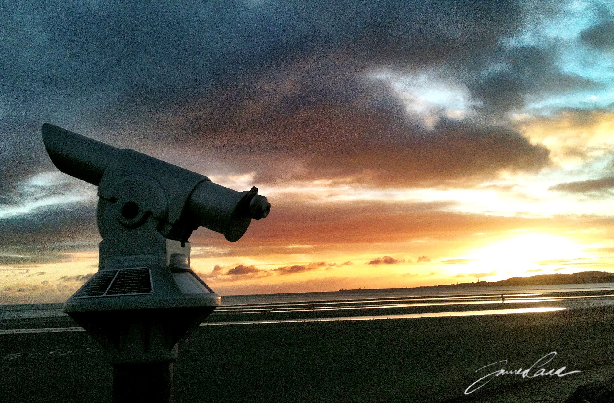 telescope looking to sea at sandymount strand
