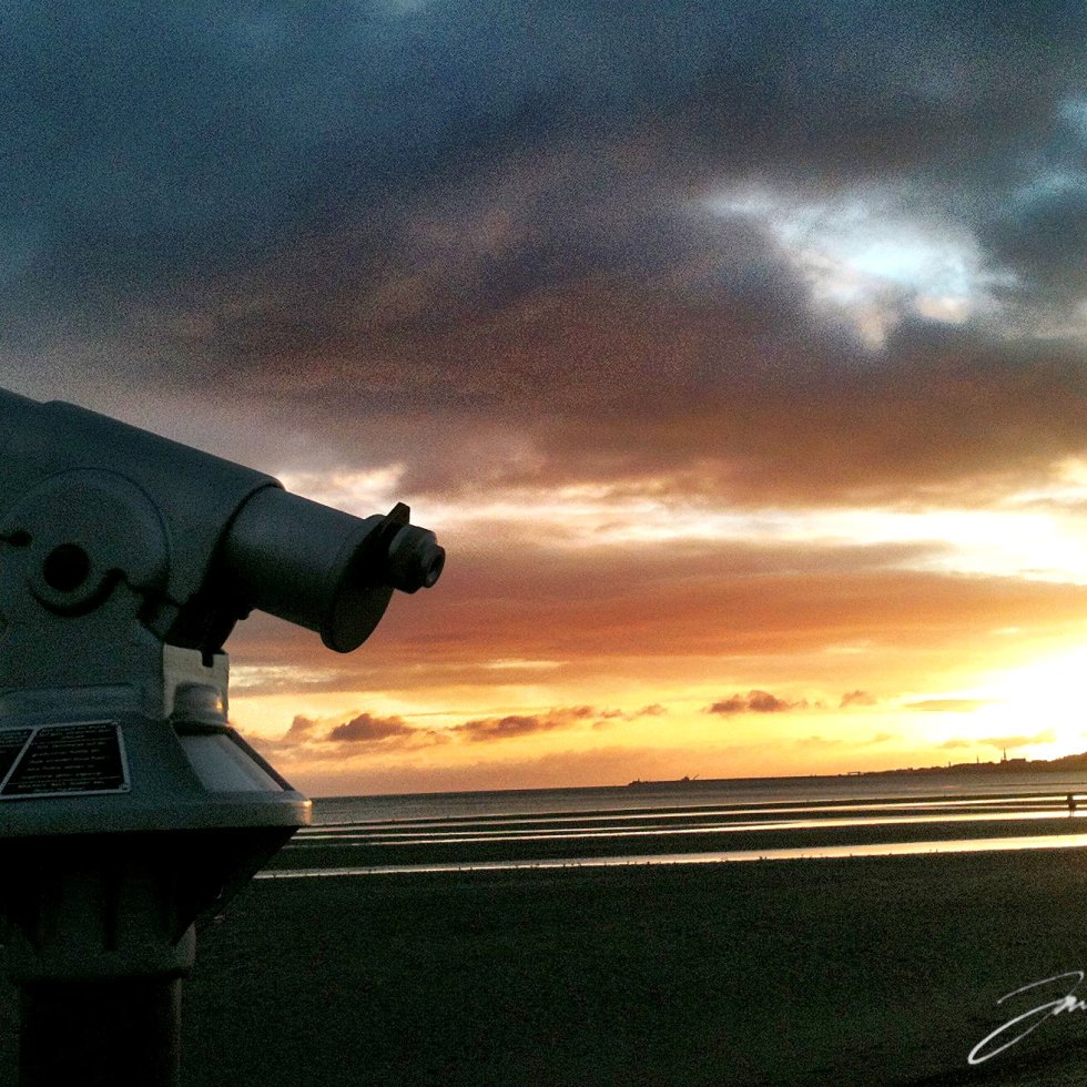 telescope looking to sea at sandymount strand